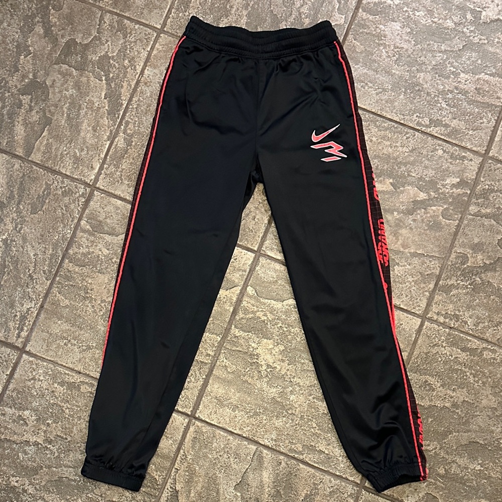 Nike Kids Black Joggers with Red Trim